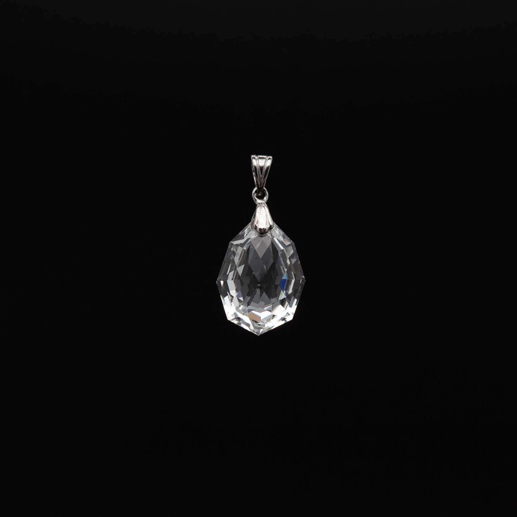 Natural 14-20mm Tumble Cut Crystal Pendant with Rhodium Plated Silver Bail