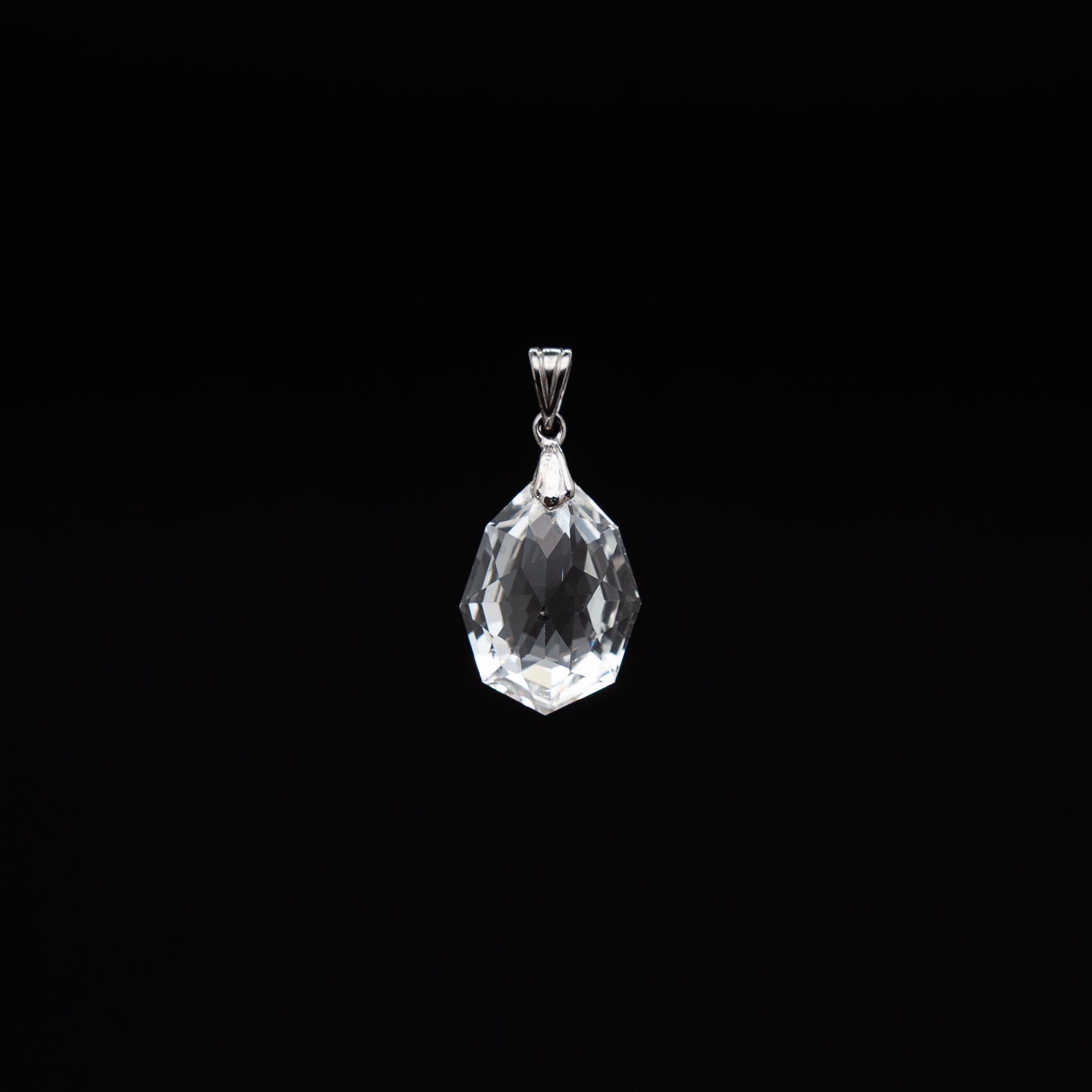 Natural 14-20mm Tumble Cut Crystal Pendant with Rhodium Plated Silver Bail