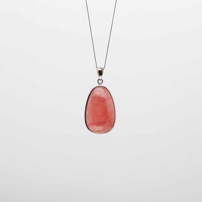 Drop Shape Rhodochrosite Pendant: A Touch of Blushing Elegance